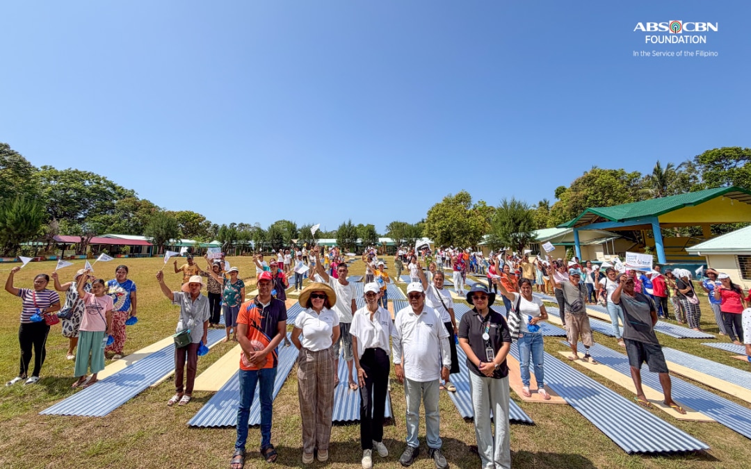 ABS-CBN Foundation Sagip Kapamilya distributes house repair kits to more than 300 families in Jomalig, Quezon